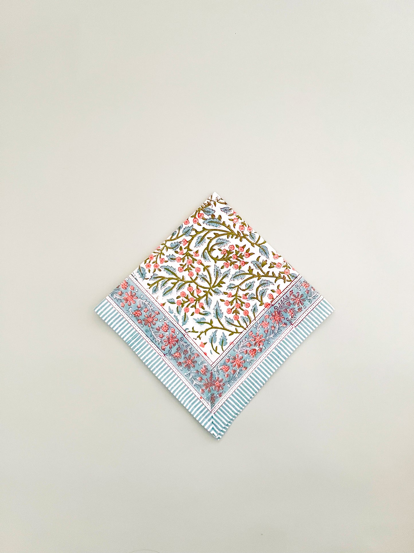 Pink/blue block print dinner napkin