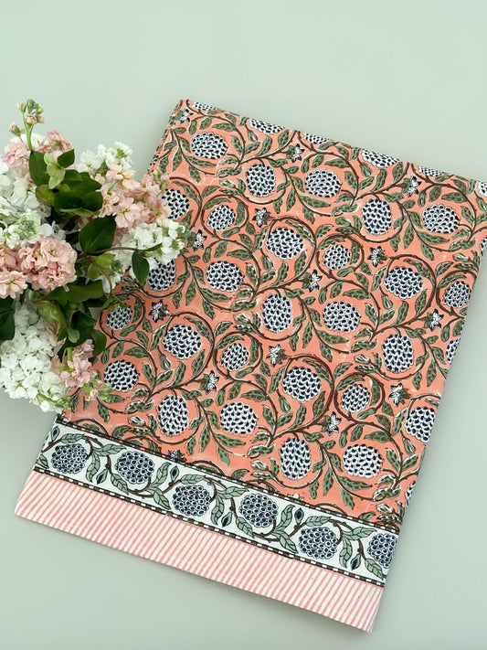 Orange print tablecloth, 72 x 132 in