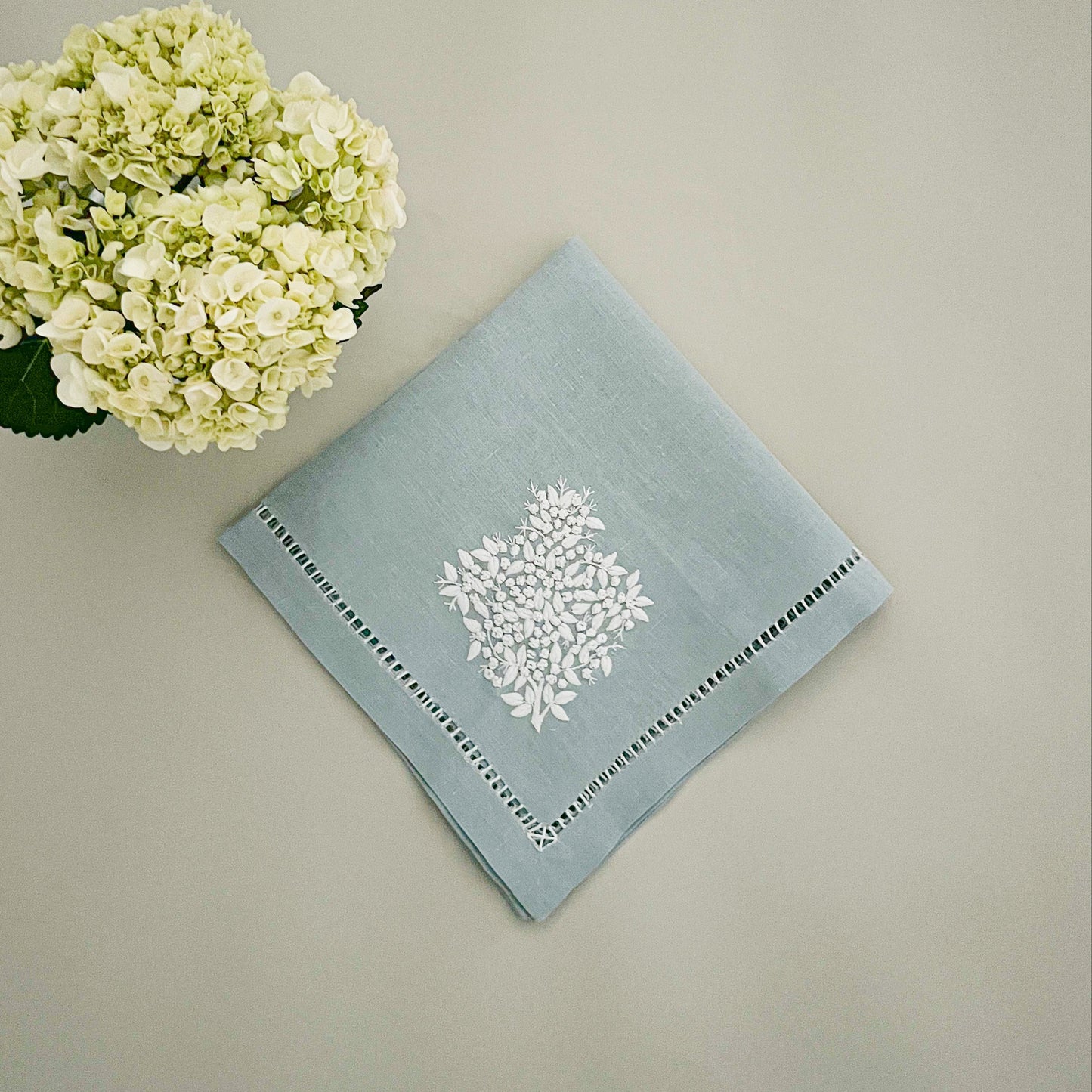 Light blue with white embroidery dinner napkin